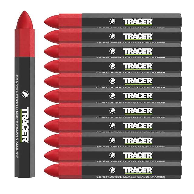 Crayons de marquage à la cire rouges Tracer posés sur une planche humide